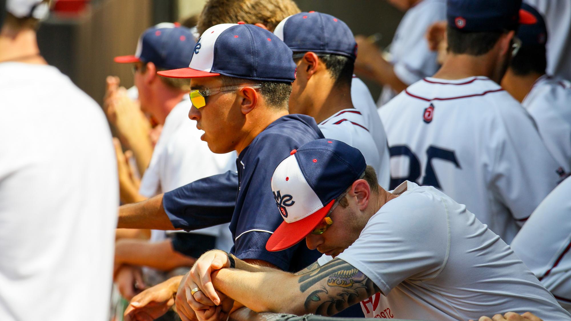Max Molz (center) in the dugout during a NCAA Regional in 2016